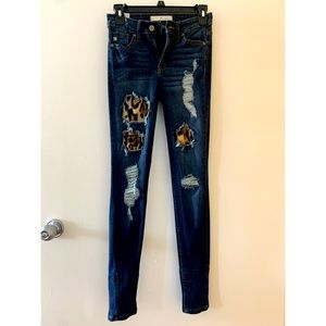 Dark distressed skinny jeans. Size 23.